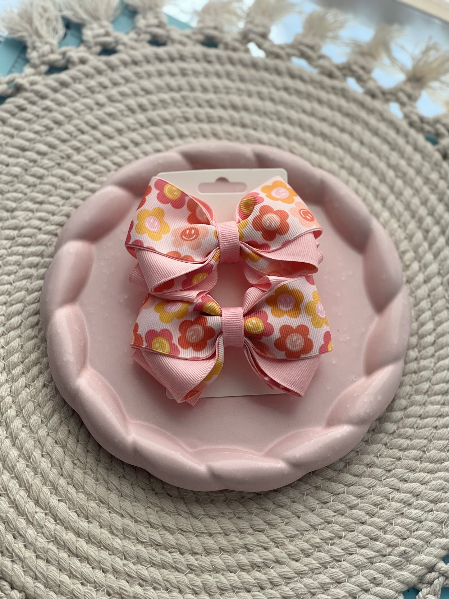 Smiles and flowers pigtail bows